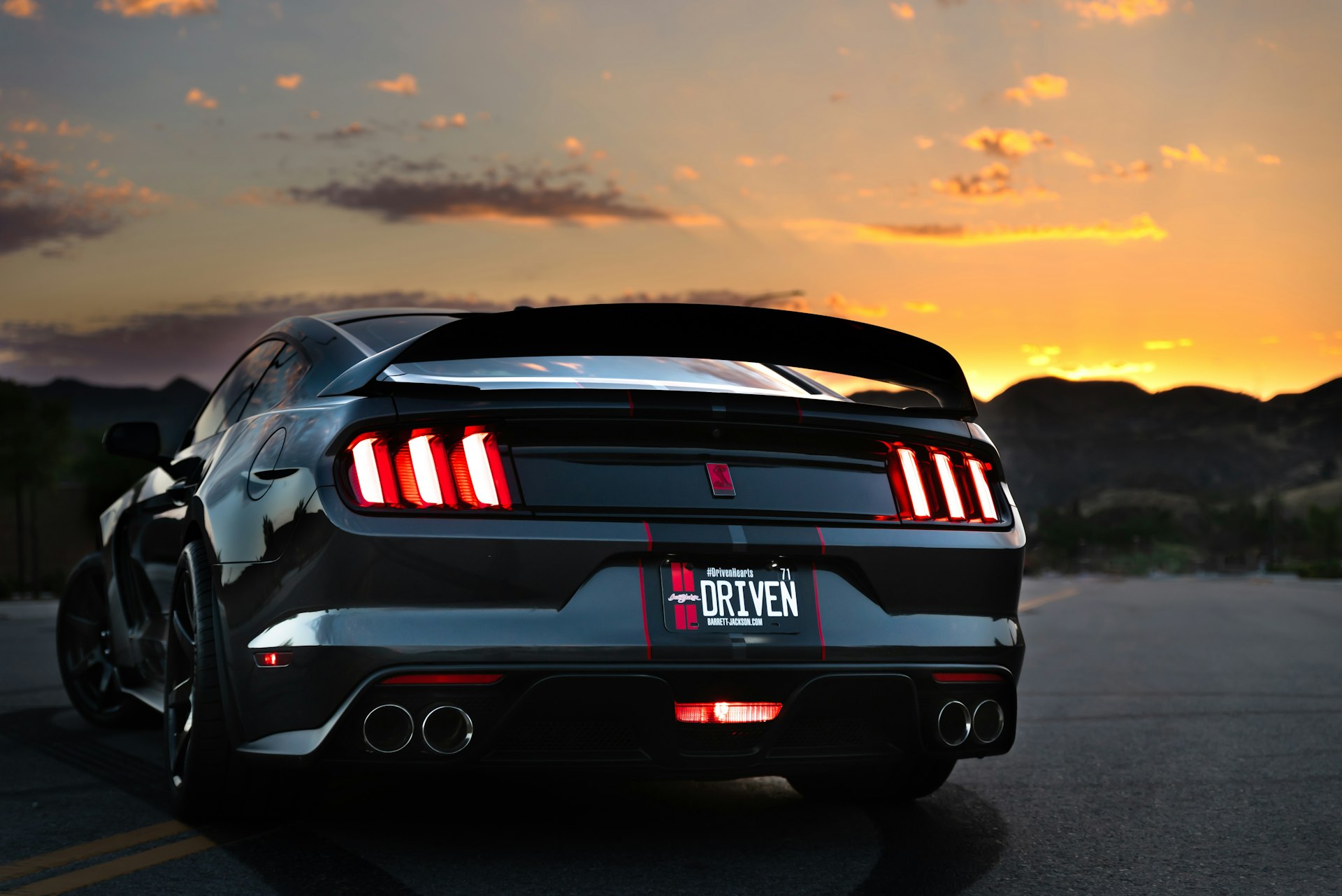 Quad exhaust tips of a Shelby Mustang