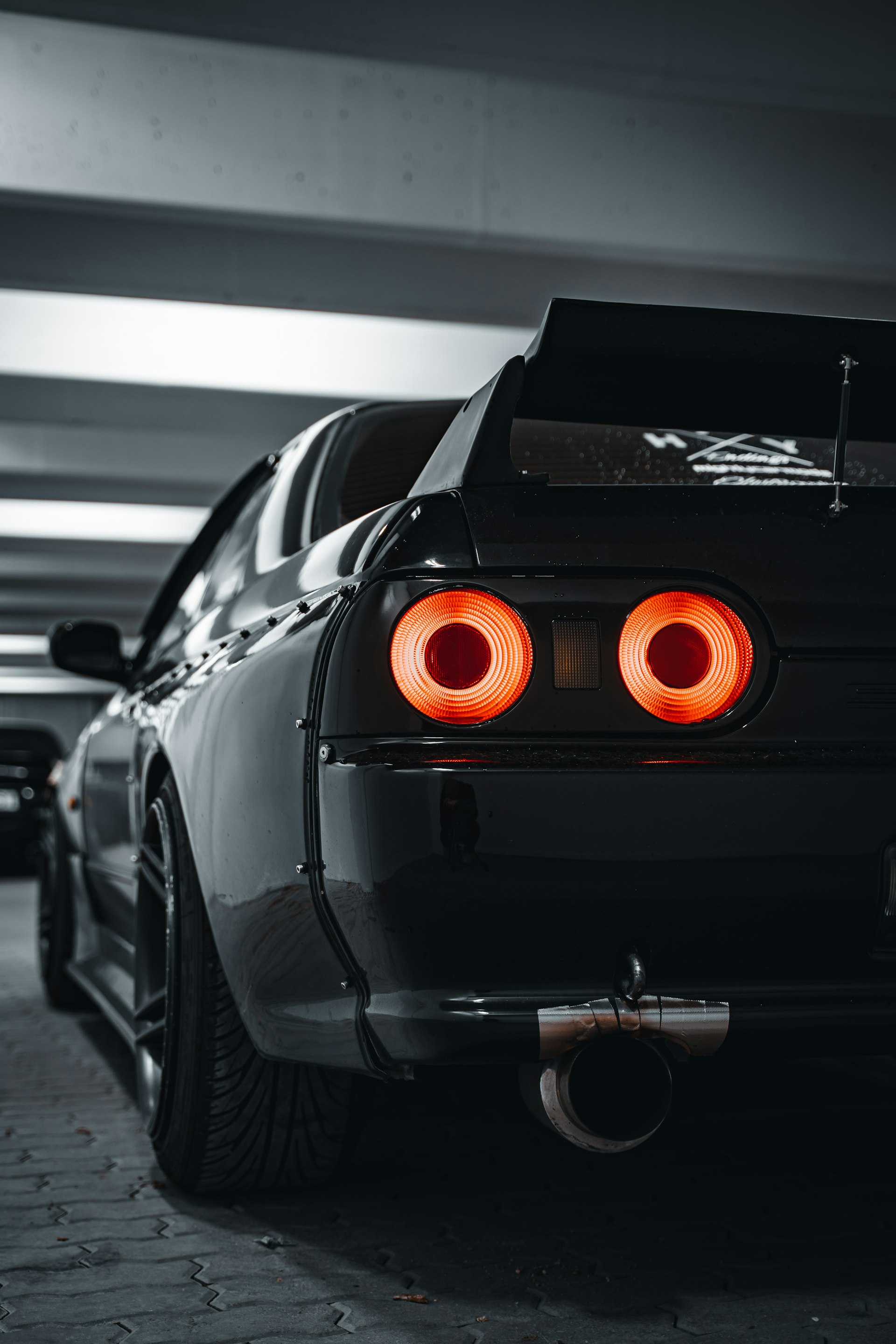 Round tail lights glowing red